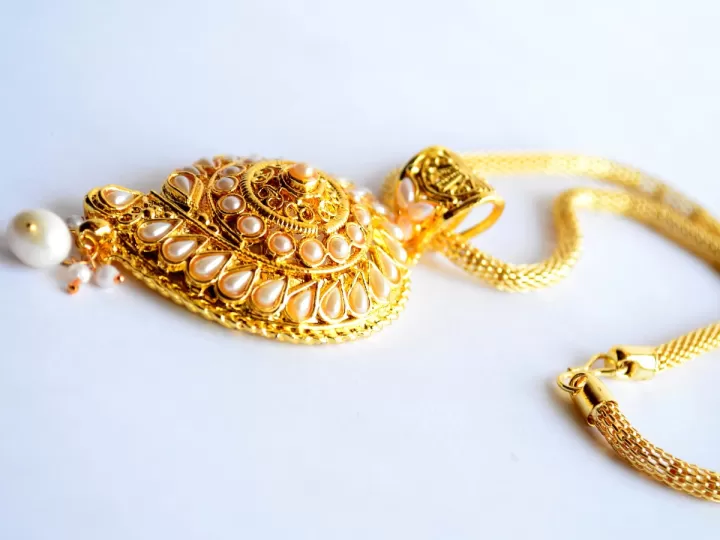 pendientes versace oro 18k